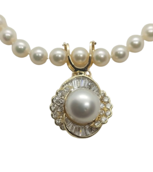 white pearl baguette, round, and trilliant diamond gold pendant